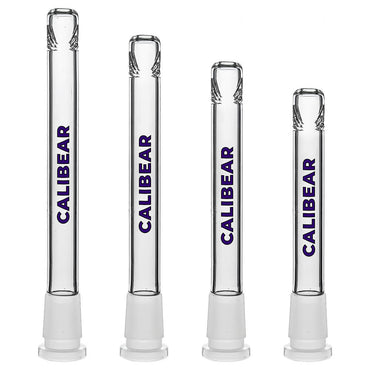 Four clear glass Dank Banger Premium Tri-Seed Slotted Ice Pinch Downstems in varying lengths, showcasing the unique triangular ice pinch restriction at the tip and clear embossed side logos.