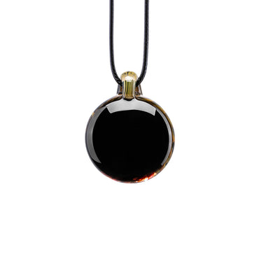 A spherical handcrafted glass pendant necklace showcasing detailed green and gold flower petals spiraling inward toward a brilliant, floating embedded opal gemstone.
