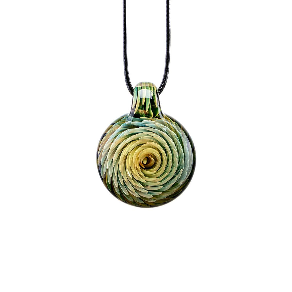 A spherical handcrafted glass pendant necklace showcasing detailed green and gold flower petals spiraling inward toward a brilliant, floating embedded opal gemstone.